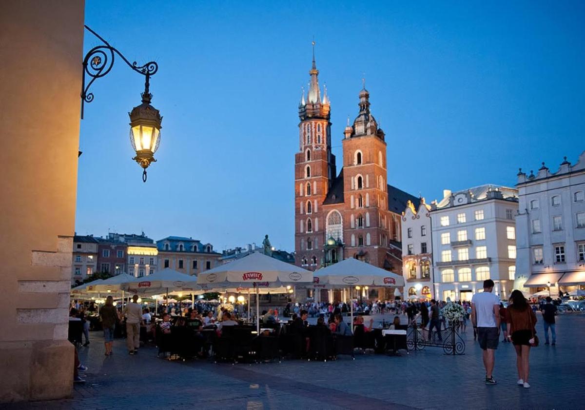 Evening view of Krakow’s Main Square and St. Mary’s Basilica