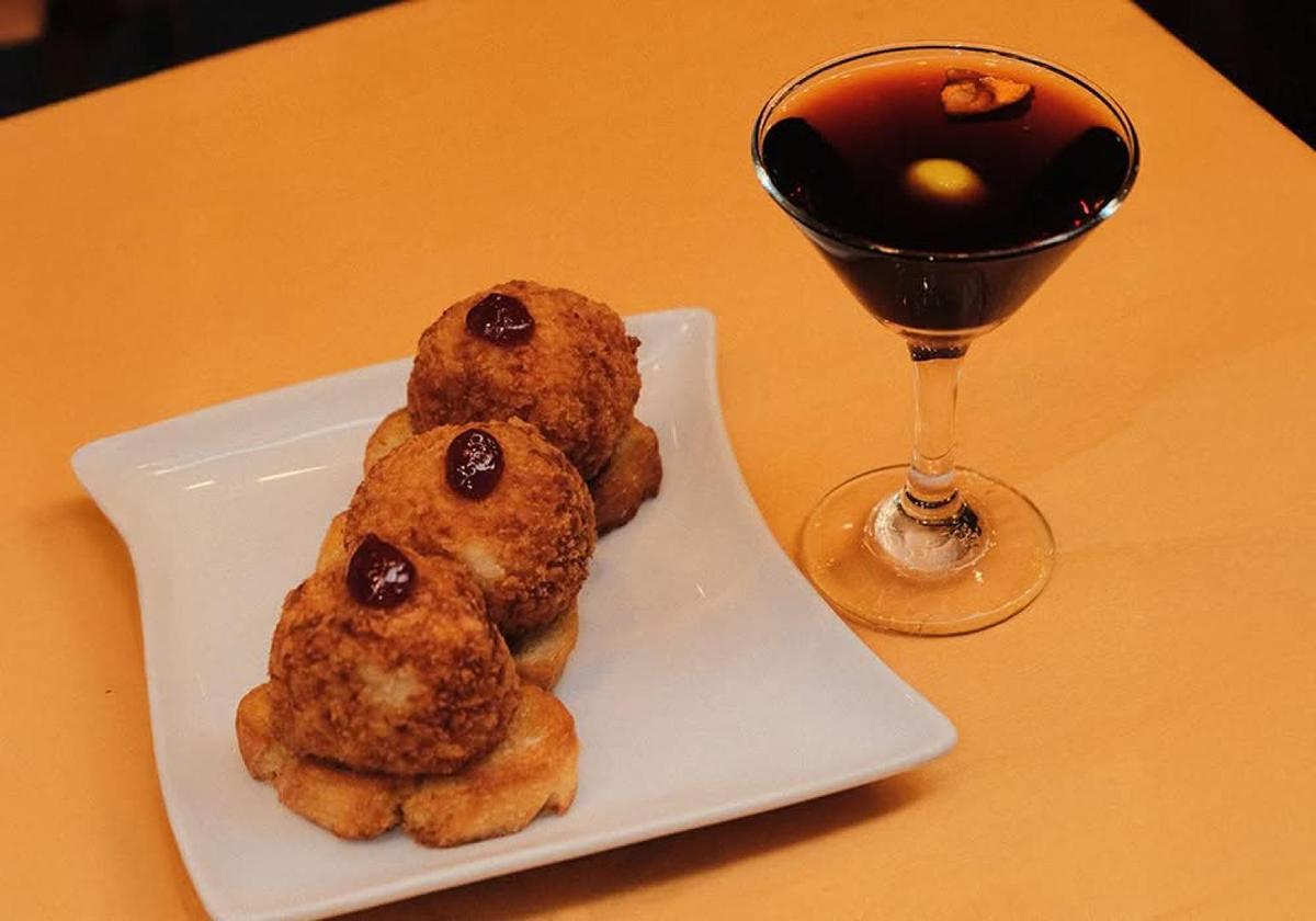 Pastry and cocktail served during a Bilbao food tour