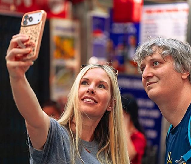 Travelers taking a selfie together during a guided city tour