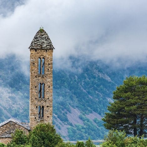 clouds over sant miquel engolasters church andorra