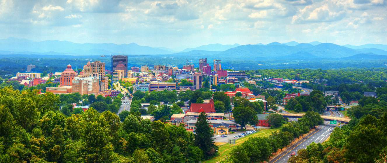Asheville, North Carolina skyline nestled in the Blue Ridge Mountains