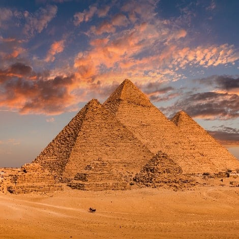 sunset view of pyramid complex of giza in cairo