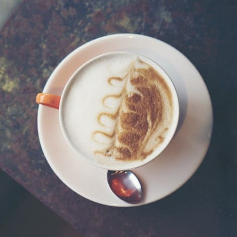 coffee latte art in coffee shop cafe vintage filt