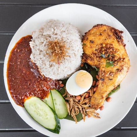 nasi lemak with fried chicken and sambal malaysia