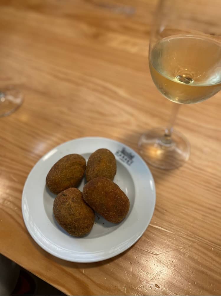 Alheira Croquetes and Glass of White Wine
