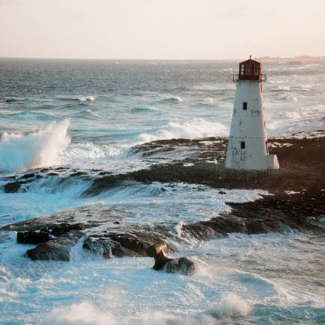 lighthouse at nassau bahamas in rough waters