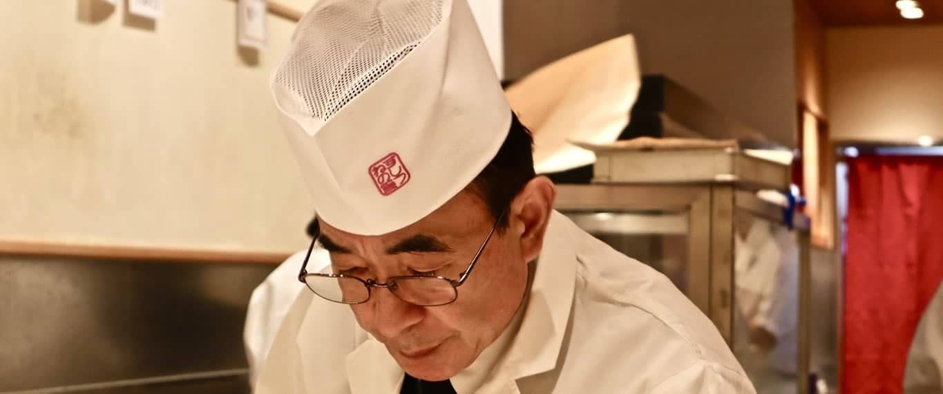 Chef in white hat
