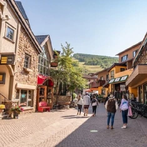 People explore the beautiful mountain village in summer