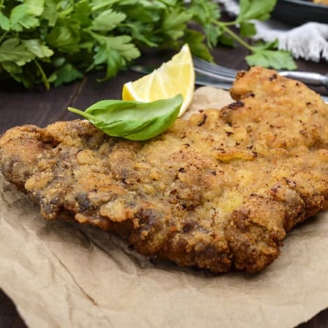 homemade vienna schnitzel on the wooden backgrou